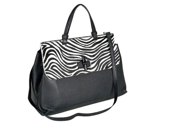 Bolso de piel artesanal solapa estampada