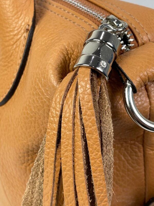 Bolso de piel transformable