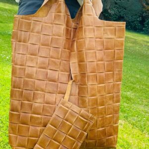 Bolso saco piel con efecto trenzado