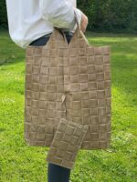 Bolso saco piel con efecto trenzado