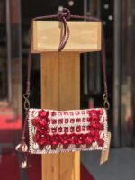 Bandolera de piel con concha