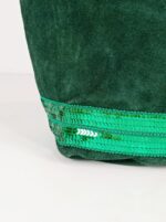 Bolso de piel con serraje y brillo estampado