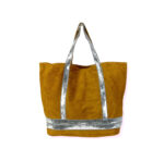 Bolso de piel con serraje y brillo estampado