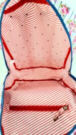 Mochila escolar flores y rallas