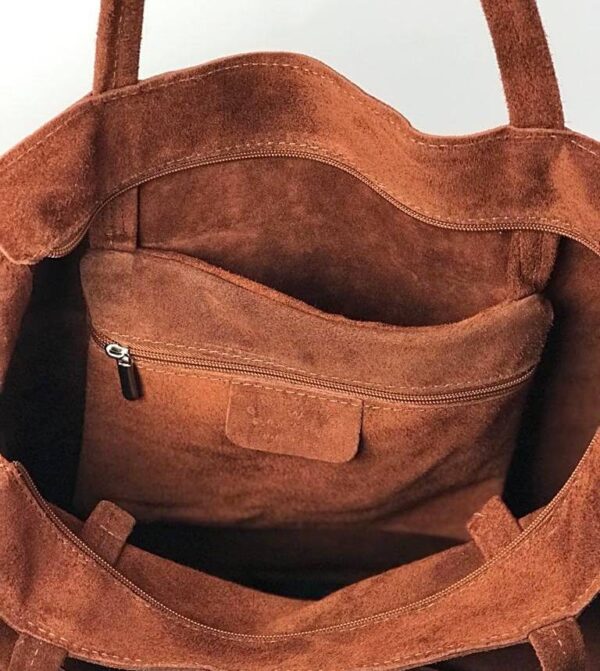 Bolso de piel con bolsillos exteriores