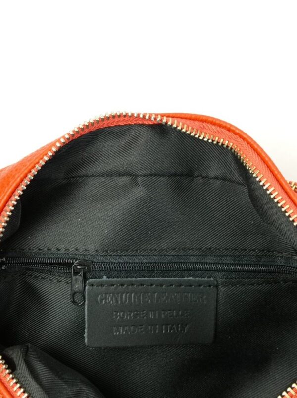 Bandolera de piel con tres bolsillos