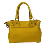 Bolso piel con bolsillo frontal y cierre giro decorativo