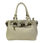 Bolso piel con bolsillo frontal y cierre giro decorativo