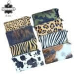 Cartera en Piel Italiana con Pelito, Diseño Animal Print, Cremallera y Asa Corta Extraíble para Mujer - Imagen 2
