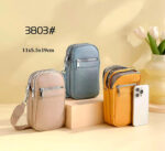 Bolsito Portamovil Sintético con Bolsillo Frontal y 3 Cremalleras Principales para Mujer