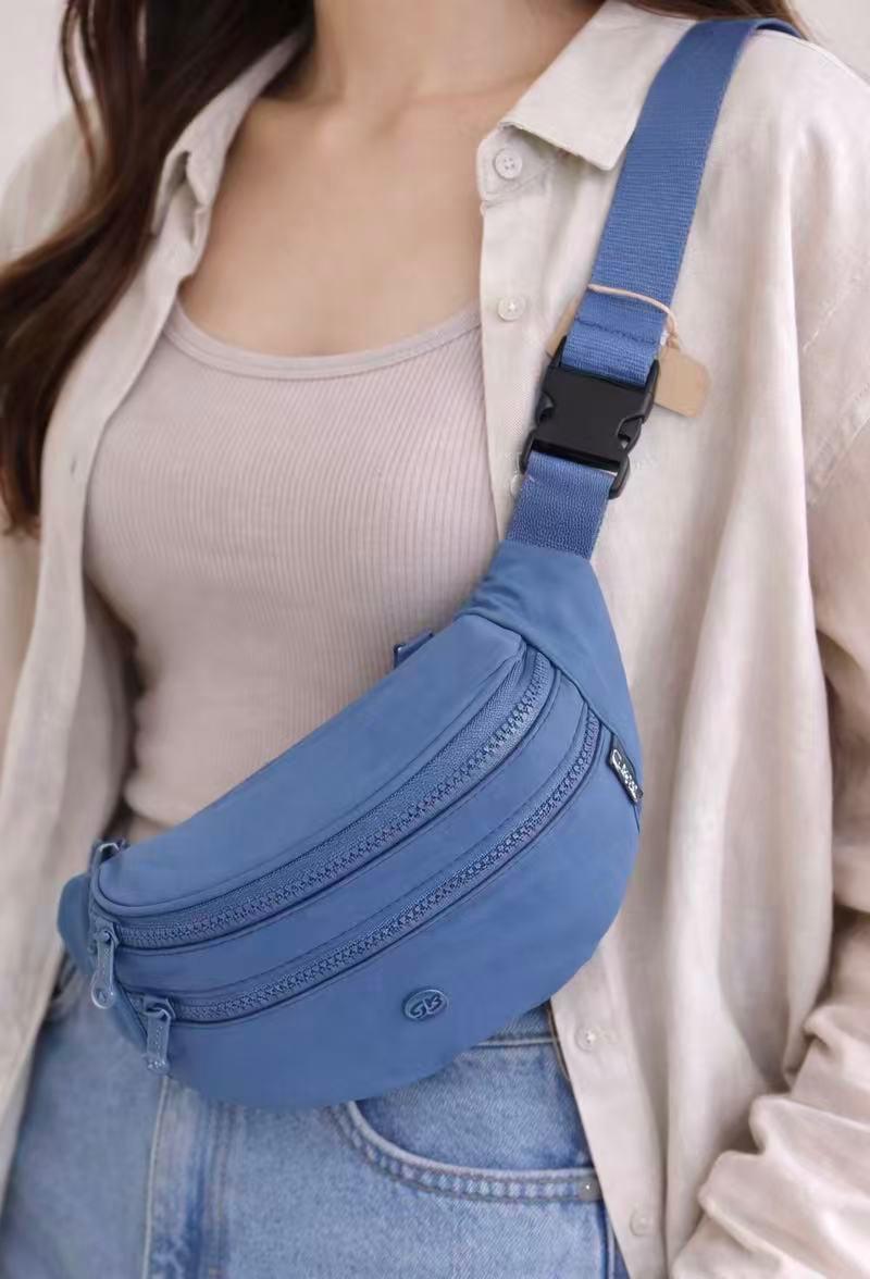 CGFA6702-Principal Riñonera Compacta en Tela Nylon para Mujer con Bolsillo Frontal y Trasero con Cierre de Cremallera - Imagen 1