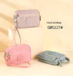 Monedero en Tela Nylon con Asa Corta Extraíble y 3 Bolsillos con Cierre de Cremallera para Mujer