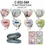 Monedero Sintético con Diseño Muñeca, Forma Corazón, Anilla y Cremallera con Flecos Mujer - Mayorista España