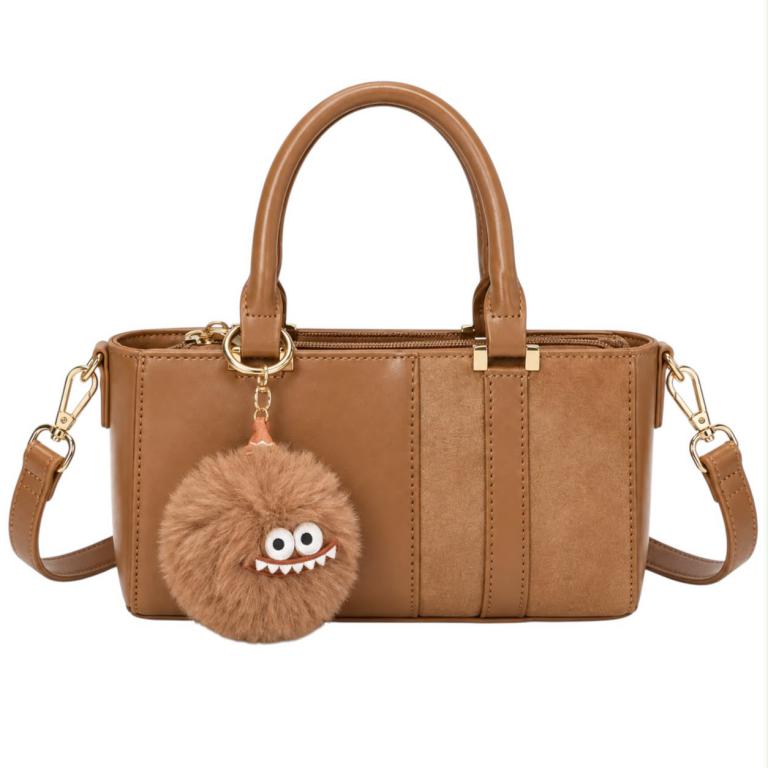 CGCE283-B Bolso de Mano Sintético para Mujer con Pompón Decorativo con Cara de Monstruo - Imagen 1